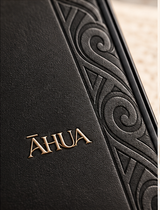 ĀHUA Signature — deboss and gold wordmark detail